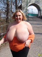 Mature babe with big mature tits outdoors