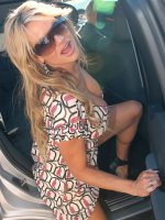 Kelly and Audrey Bitoni lick each others pussy in the backseat of the car.