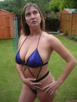 My wife in the garden in her thong