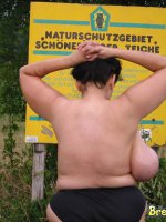 Mature babe with big mature tits outdoors