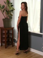 Elegant Samantha playfully posing in a black dress